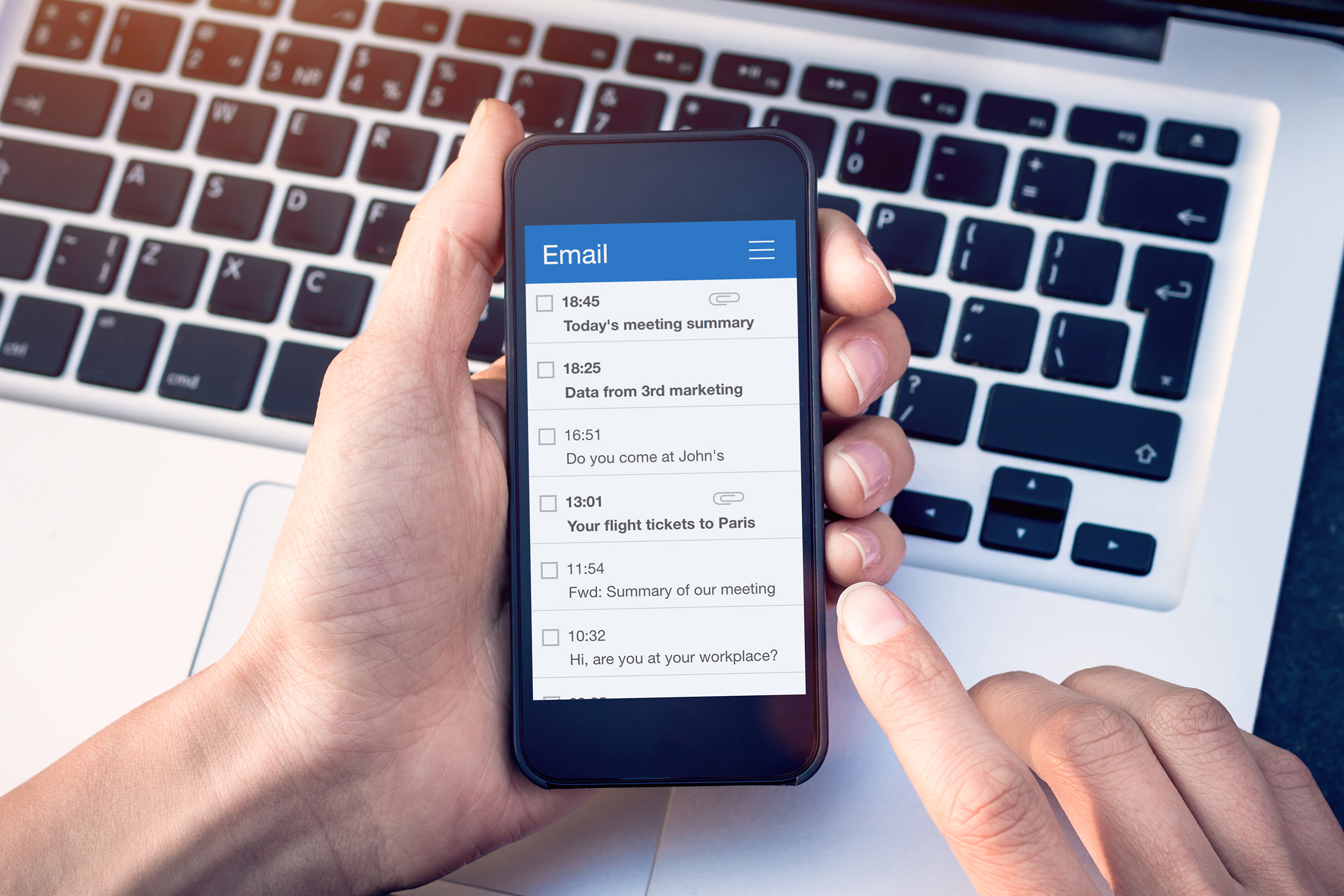 Email app on smartphone screen with business person reading mess Book a Demo