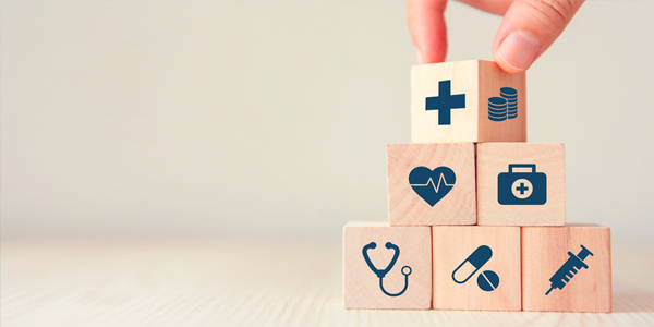 blocks with medical icons being stacked