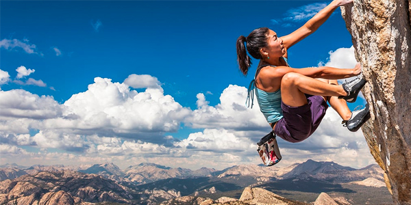 Person Rock Climbing